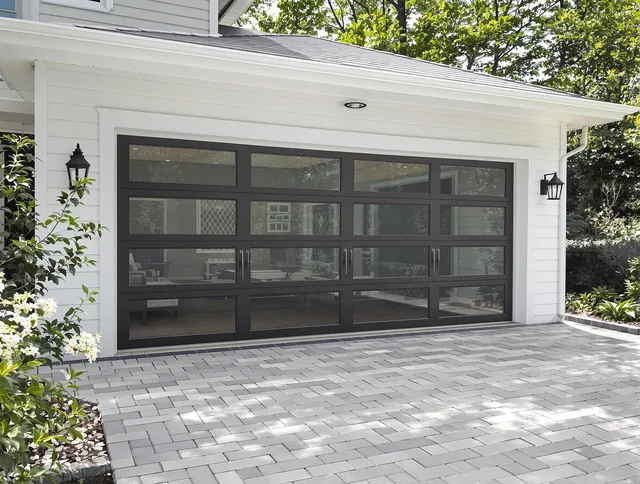 Raynham Garage Door Repair design specialist presenting custom garage door options to Raynham homeowner