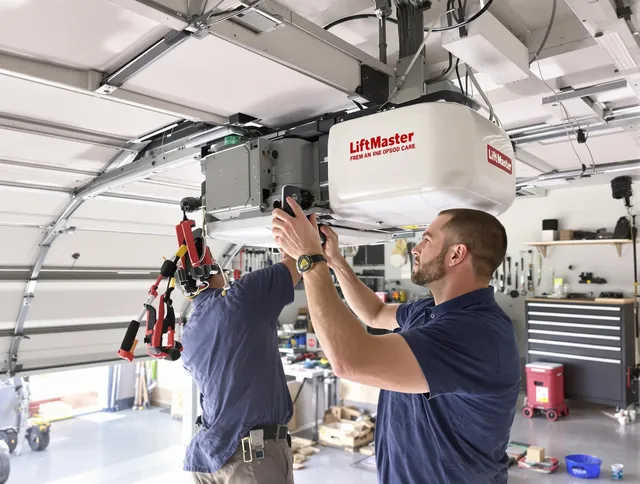 Raynham Garage Door Repair technician performing advanced diagnostics on garage opener in Raynham