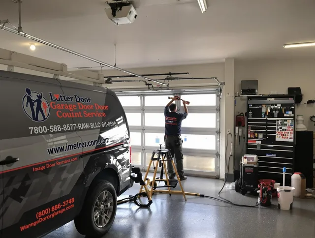 Raynham Garage Door Repair team performing same-day garage door repair in Raynham
